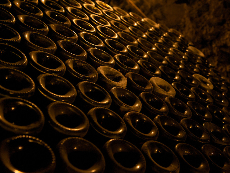 dusty bottles in the cellar of the Bouchard castle in Beaune, at the heart of Burgundy, France