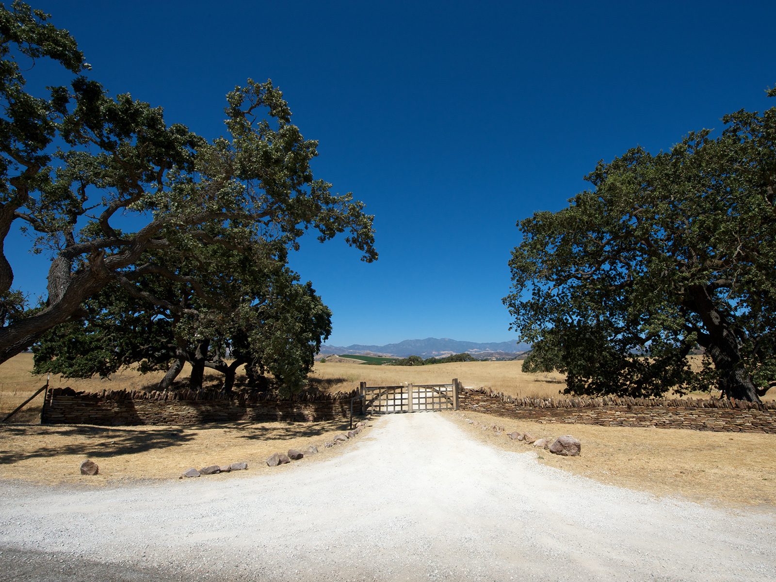 a wooden gate in the Santa Barbara countryside, outside of Los Angeles, California, USA