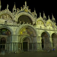 the ghosts of tourists passing in front of the Basilica on Piazza San Marco, Venice, Italy