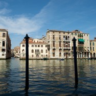 mooring posts on the side of the Grand Canal in Venice, Italy